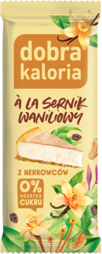 Baton Dobra Kaloria waniliowy sernik z nerkowców, widok z przodu, bez dodatku cukru, na żółtym tle.