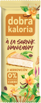 Baton Dobra Kaloria waniliowy sernik z nerkowców, widok z przodu, bez dodatku cukru, na żółtym tle.