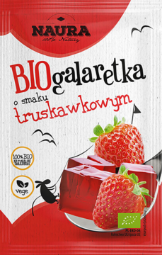 Czerwono-biała saszetka Naura BIO galaretka truskawkowa, wegańska, z obrazkiem galaretki na łyżce.