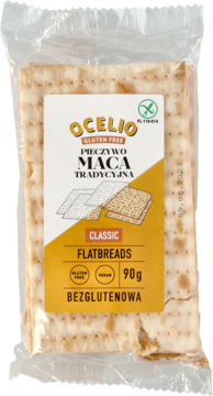 Ocelio bezglutenowe pieczywo maca tradycyjna w przezroczystej folii, żółto-biała etykieta, widoczne płaskie wafle.