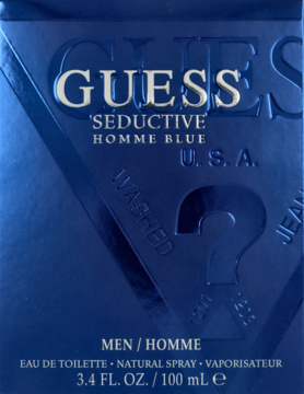 Granatowe, teksturowane pudełko perfum Guess Seductive Homme Blue 100ml z wytłoczonym logo i nazwą na froncie.