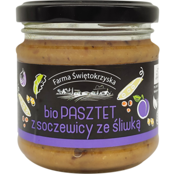 Słoik bio pasztetu Farma Świętokrzyska z soczewicy ze śliwką, ciemna etykieta, widok z przodu, z ilustracjami warzyw.