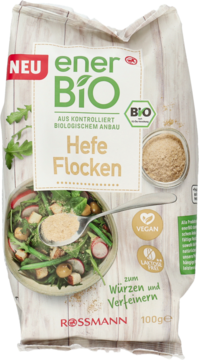 Białe opakowanie enerBiO Bio Hefe Flocken (płatki drożdżowe) Rossmann, wegańskie, do przyprawiania, widok z przodu.