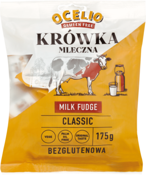 Bezglutenowe krówki mleczne Ocelio 175g. Żółto-biała torebka z grafiką krowy i napisem Milk Fudge Classic, widok frontalny.
