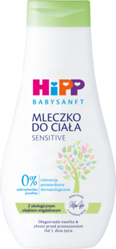 Białe mleczko HiPP BabySanft Sensitive do ciała w butelce z zieloną nakrętką, kolorowe logo, grafika drzewa, z przodu, od 1. dnia życia.