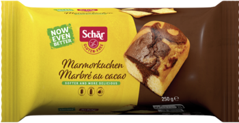 Schär bezglutenowe ciasto marmurkowe z kakao w żółto-brązowym opakowaniu, widoczny kawałek.