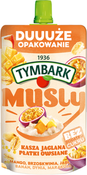 Tymbark Musli: duża pomarańczowa saszetka z mango, owsianką, kaszą jaglaną, bez cukru. Widok z przodu.