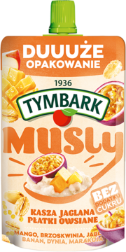 Tymbark Musli: duża pomarańczowa saszetka z mango, owsianką, kaszą jaglaną, bez cukru. Widok z przodu.