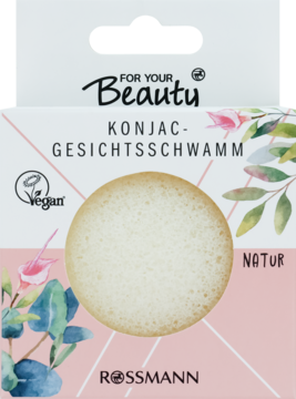Okrągła naturalna gąbka Konjac For Your Beauty Rossmann, częściowo widoczna w różowo-białym opakowaniu.