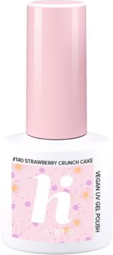 Wegański lakier hi hybrid #140 Strawberry Crunch Cake, biała butelka z różową zakrętką i kropkami.