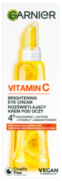 Żółty krem pod oczy Garnier Vitamin C Brightening z aplikatorem, widok z przodu, 4% niacynamid i kofeina.