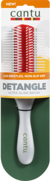 Cantu Detangle Ultra Glide Brush, biała rękojeść i czerwone włosie, w pomarańczowo-zielonym opakowaniu.