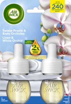 Dwupak wkładów Air Wick Linen & White Orchid na karcie, z widocznymi żółtymi buteleczkami i białymi wtyczkami.