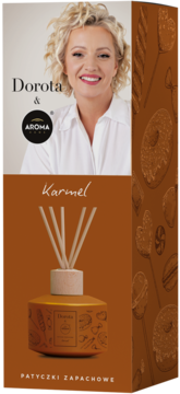 Dyfuzor zapachowy Karmel Dorota & Aroma Home. Brązowe opakowanie z portretem i butelką z patyczkami.