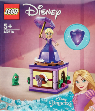 Zestaw LEGO Disney Wirująca Roszpunka 43214. Obrotowa scena, figurka Roszpunki z parasolem i Pascala, na pudełku. Widok z przodu.