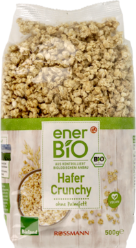 Paczka enerBiO Hafer Crunchy 500g, transparentna z zielono-białą etykietą, miską owsianych płatków i napisem 'vegan', widok z przodu.