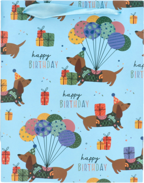 Błękitna torebka prezentowa z wesołymi jamnikami w czapkach, balonami, prezentami i napisem Happy Birthday.