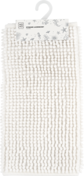 Biały dywanik łazienkowy 40x60 cm z mikrofibry, wiszący. Widoczne wypustki i metka z logo MO MO i grafiką.