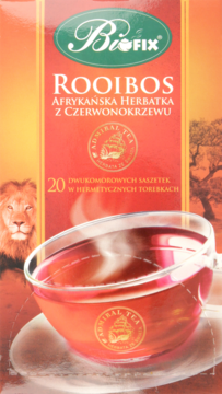 Pionowe opakowanie herbaty BioFIX Rooibos (afrykańskiej, 20 saszetek). Czerwono-pomarańczowe z lwem i filiżanką.