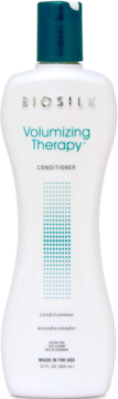 Biała butelka BioSilk Volumizing Therapy Conditioner, widok z przodu, turkusowa zakrętka, napis Volumizing Therapy.