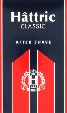 Pudełko Hâttric Classic After Shave, granatowe z czerwono-białymi pasami i herbem, widok z przodu.