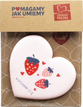 Dekorowane serce piernikowe z różowym lukrem, truskawkami i napisem 'KOCHAM CIĘ', w przezroczystym opakowaniu.