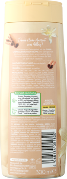 Tył beżowego żelu pod prysznic o zapachu wanilii i cynamonu, z widocznym składem, zielonymi symbolami i kodem kreskowym.