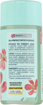 Tył zielonej butelki zmywacza do paznokci Isana, z różowymi kwiatami i instrukcjami w języku polskim.