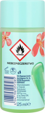 Tył zielonej butelki zmywacza do paznokci ISANA 125 ml, z symbolem łatwopalności i kodem kreskowym.