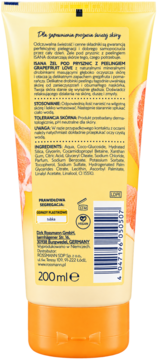 Tył żółtej tubki żelu pod prysznic Isana Grapefruit Love z peelingiem, widoczne polskie napisy i skład.