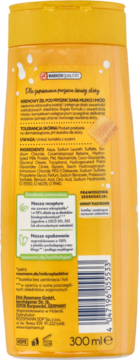 Tył opakowania żelu Isana Milk & Honey. Żółta butelka z opisem, składnikami, kodem kreskowym i objętością 300 ml.