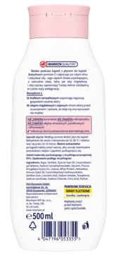 Tył białej butelki Płynu do kąpieli Mamas Babydream, różowa nakrętka, tekst o składzie z olejem migdałowym.