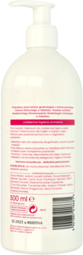 Tył białej butelki płynu do higieny intymnej z kwasem mlekowym, 500 ml, z pompką i etykietą.