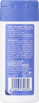 Isana Mleczko do Ciała 50ml, biała butelka, tył z fioletową etykietą, opis pielęgnujący skórę suchą, skład.