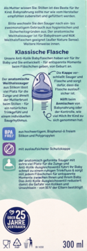 Przezroczysta butelka Babydream 300 ml, szeroka szyjka, z niebieskim smoczkiem silikonowym i miarką, z przodu.