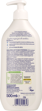 Tył białej butelki szamponu i żelu Babydream 500ml, widoczny skład z rumiankiem i pantenolem.