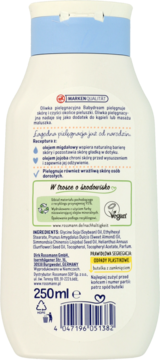 Tył białej butelki Babydream Oliwka pielęgnacyjna dla niemowląt, z polskim opisem i symbolami recyklingu.