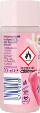 Tył różowego dezodorantu Rossmann 50 ml. Widoczna etykieta z ostrzeżeniem o palności, kodem kreskowym i logo VEGAN.