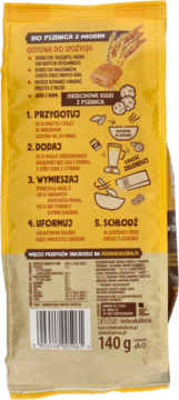 Tył żółtego opakowania Bio Pszenicy z miodem Dobra Kaloria (140g), z instrukcjami przygotowania i tabelą wartości odżywczych.