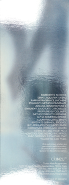 Tył odblaskowego opakowania perfum CK IN2U, z wyraźną listą składników i logo Calvin Klein.