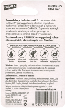 Tył opakowania truskawkowego balsamu do ust Carmex w tubce. Widoczne informacje o działaniu klinicznym i składzie.