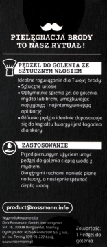 Pędzel do golenia Rossmann ze sztucznym włosiem. Biały tekst na czarnym tle, opis cech i zastosowania.