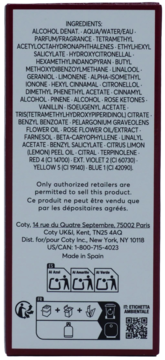 Tył opakowania wody perfumowanej Hugo Boss Femme, z listą składników, danymi Coty i symbolami recyklingu.