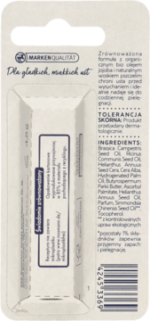 Tył opakowania pomadki ochronnej z bio olejem jojoba i 99% naturalnymi składnikami, widoczny barcode.