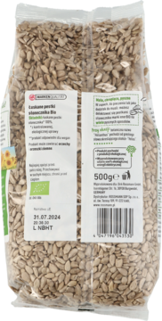Tył przezroczystego opakowania pestek słonecznika enerBiO 500g z etykietami produktu i kodem kreskowym.