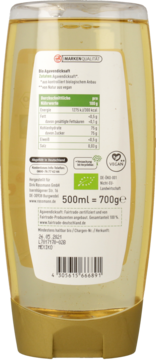 Tył butelki EnerBio syropu z agawy 500ml, przezroczysta z żółtym płynem, widoczne etykiety z certyfikatami BIO i wegan.