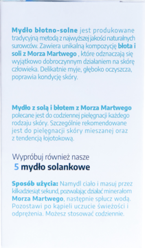 Biała etykieta informacyjna o naturalnym mydle błotno-solnym z Morza Martwego, z niebieskim tekstem.