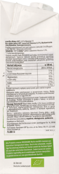 Tył białego kartonu mleka enerBiO UHT 3,5% z widoczną tabelą wartości odżywczych i zielonymi informacjami.