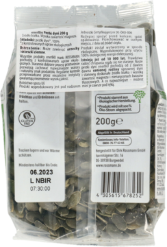 Tył przezroczystego opakowania enerBIO pestki dyni 200 g, widoczne zielone nasiona i biała etykieta bio.