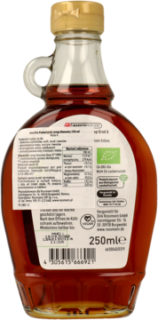 Tył szklanej butelki enerBIO kanadyjskiego syropu klonowego 250 ml, z etykietą, wartościami odżywczymi i kodem kreskowym.